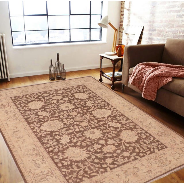 "Enhance the ambiance of your home with this magnificent Persian-influenced Turkish hand-knotted rug made by skilled...