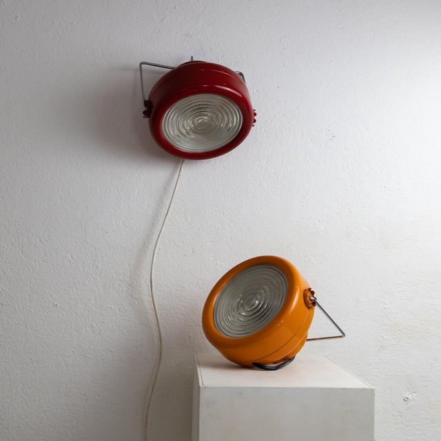 Description Schuko 2000 lamp designed by Achille and Piergiacomo Castiglioni for Flos. Red painted metal body with a...