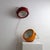 Description Schuko 2000 lamp designed by Achille and Piergiacomo Castiglioni for Flos. Red painted metal body with a...