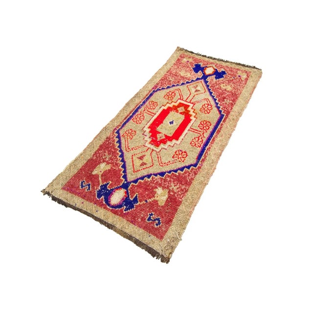Vintage Handknotted decorative mini rug from Konya region of Turkey. Approximately 45-55 years old. In very good condition.