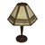 This antique Arts & Crafts table lamp, attributed to Bradley & Hubbard, features a distinctive six-panel slag glass shade....
