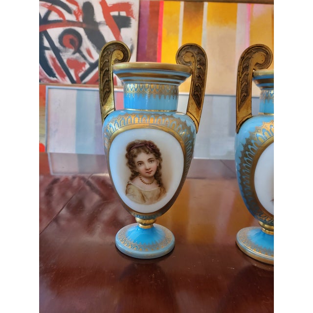 Antique museum quality pair of bohemian glass moser overlay vases with gilt bronze handle. Exquisitely hand made and hand...