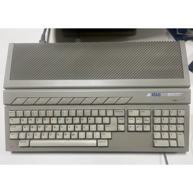 Atari st1040 with atari sm125 monochrome monitor and mouse the atari st is a second generation home computer based on the...