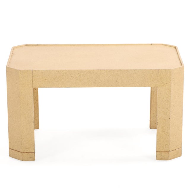 A sophisticated pair of vintage end tables in the style of Karl Springer, featuring architectural faceted legs and a...