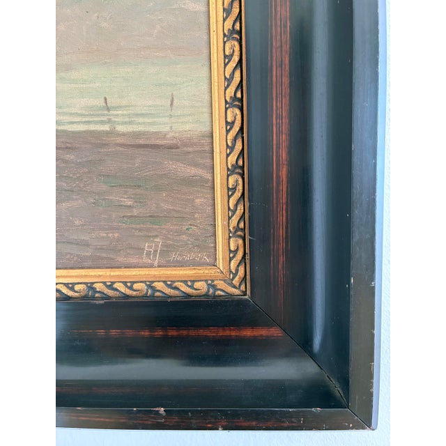 This original vintage seascape oil painting, dating from around the 1940s, shows a small beachside cabin near the sea. The...