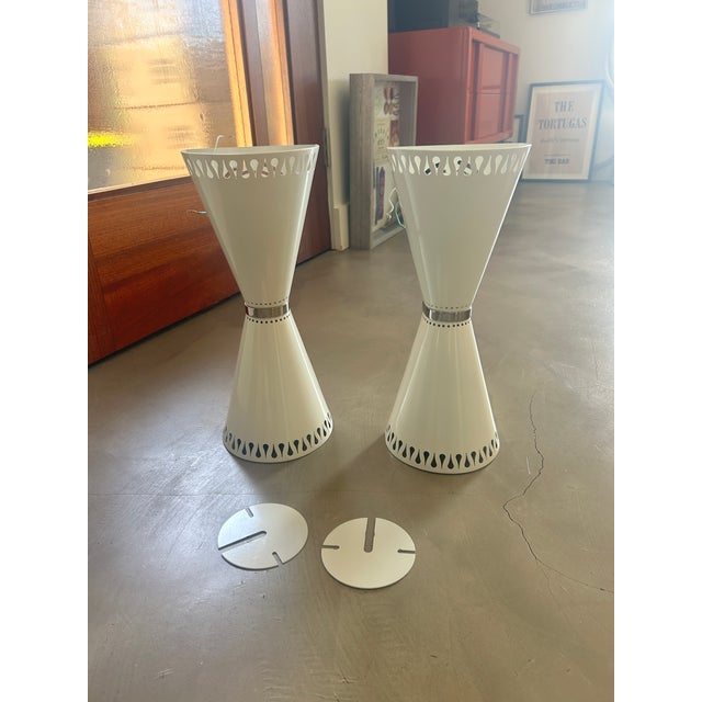 This pair of Jonathan Adler sconces will enhance any space with a touch of modern whimsy. They have been gently used with...
