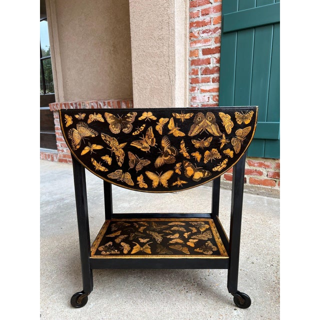 Vintage English Bar Cart Trolley Drop Leaf Chinoiserie Butterfly Lacquer Table. Direct from England, a beautiful hand-...