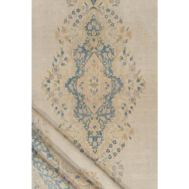 A beautiful hand-knotted rug, traditionally crafted by skilled artisans using fine-quality wool. The hand-knotted...
