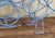 Mid Century Modern Blue Wire Fish Wine Bottle Holder Sculptural Bar Rack For Sale In Providence - Image 6 of 6