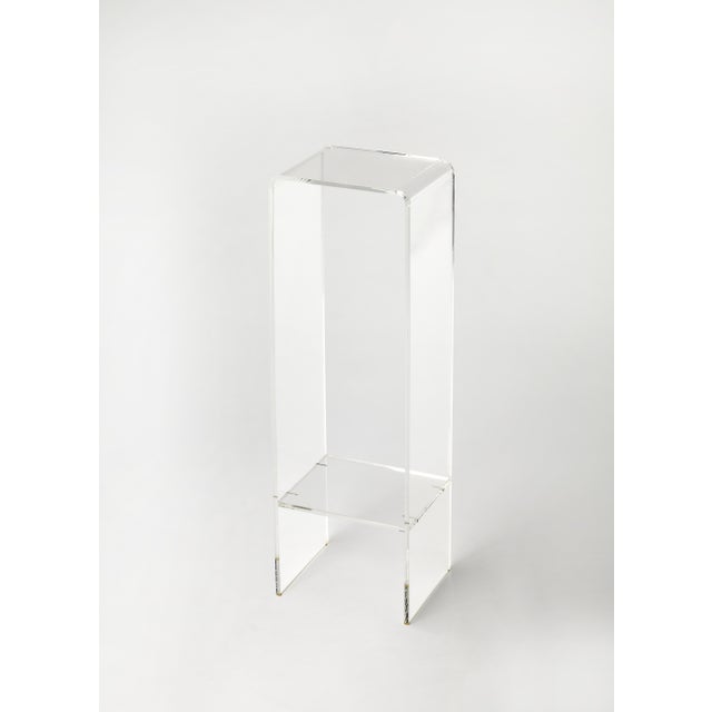 With a minimalist modern design this elegant plant stand will enhance any space. Crafted from clear acrylic, it features a...