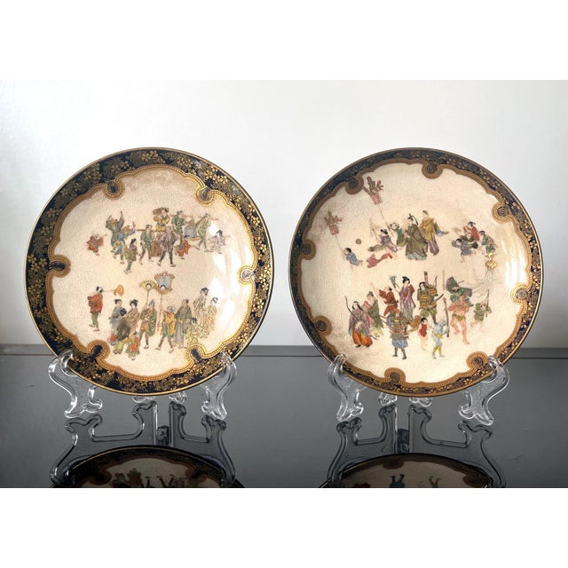 A pair of Satsuma ceramic plates made by Kinkozan studio circa 1880-1900s during the late Meiji Period. Each dish features...