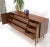 Mid-Century Modern long nine drawers dresser walnut credenza with doors compartments on sculptural legs. Refinished in...
