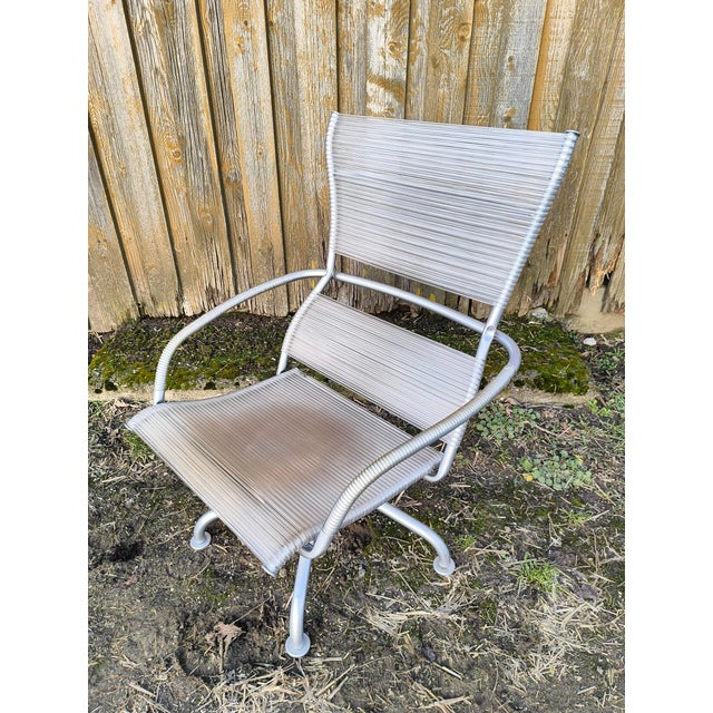 Beautiful sculptural armchair by Tito Agnoli for Bonacina in good used condition. The chair has a few signs of age-related...