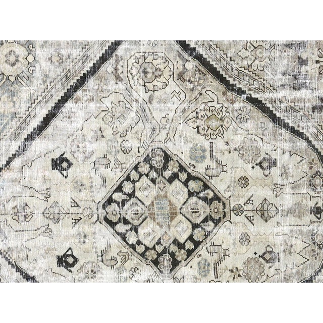 This Antique Persian Melayer Rug is a beautiful piece of artistry. Crafted with wool on cotton, it measures 6'7" x 12'8"....