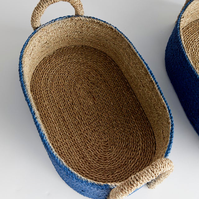 These tailored, double walled baskets are woven by hand by master artisans. Twisted seagrass is refined into rope, hand...