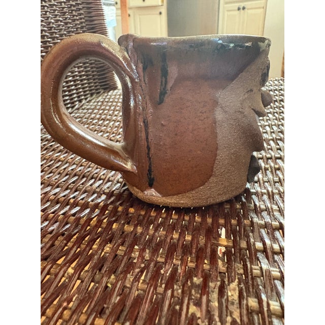 This little mug made me smile so I picked him up at a 95 year old man's garage sale. I pictured someone collecting these...