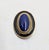 1980s oval goltone oval faux-lapis with textured goldtone rope design surround with black enamel on the outside brooch...