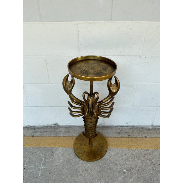 Stylish Currey & Co Lobster Georgetown Brass Table. Lobster shaped in brass. Round top and round base. Original retail...