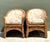 This exceptional pair of vintage armchairs perfectly captures the sophisticated tropical aesthetic of the mid-20th...