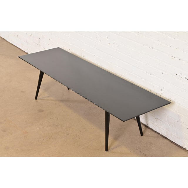 A sleek and stylish Mid-Century Modern coffee table or bench By Paul McCobb for Winchendon Furniture, "Planner Group" USA,...