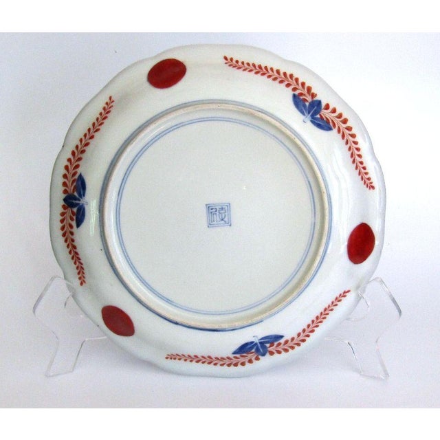 Authentic Japanese Kakiemon polychrome porcelain shallow dish, Edo Period (c.1680–1720), Arita kilns. Features rare...