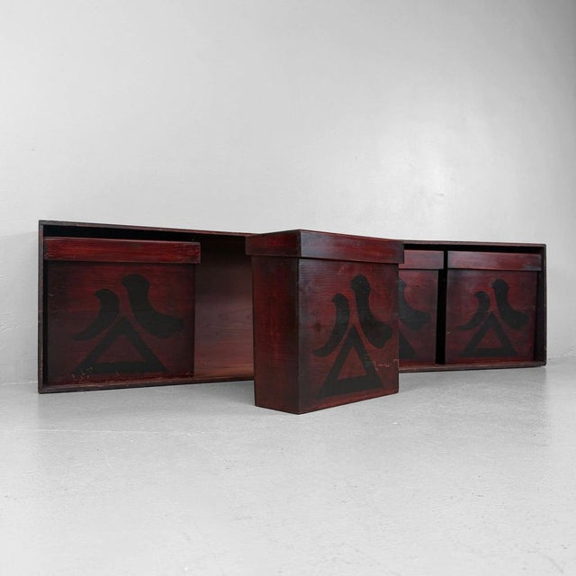 Rare Japanese set of four wooden chochin-bako, or lantern storage boxes with lids, preserved together with the original...