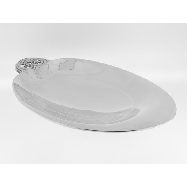 A fine Art Deco oval, footed bowl. By Tiffany & Co. In sterling silver. With a large, slightly lobed oval or heart shaped...