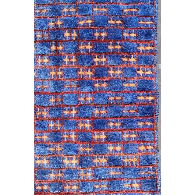 Keivan Woven Arts, Lcb-136601, kwarugs. This unique vintage Moroccan carpet is characterized by a saturated, bold blue...