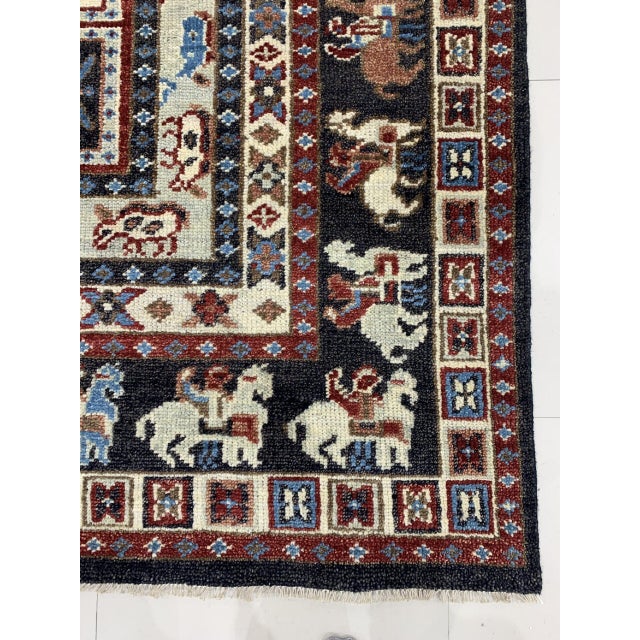Willow Oriental Charcoal Hand Knotted Wool Rug, Country of Origin: India. This exceptional piece is a contemporary...