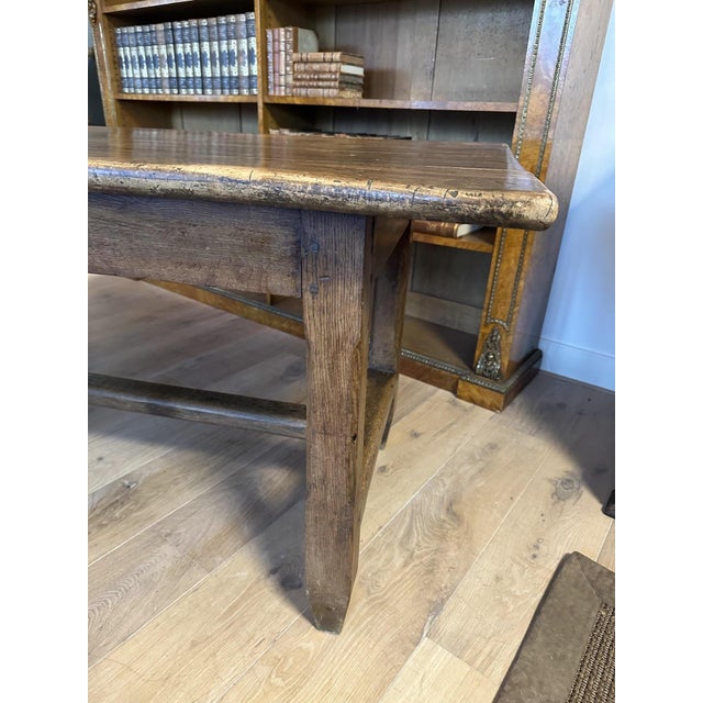 Beautiful, large, weathered antique French table in completely original condition. The base is oak and the top is...