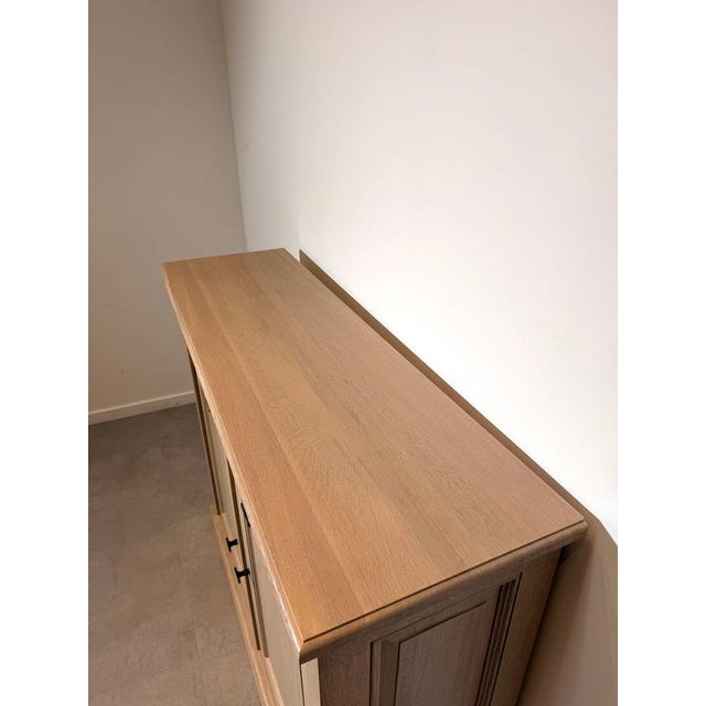 Elegant, timeless, and exceptionally well-crafted, this r r interiors oak sideboard is a versatile storage cabinet that...