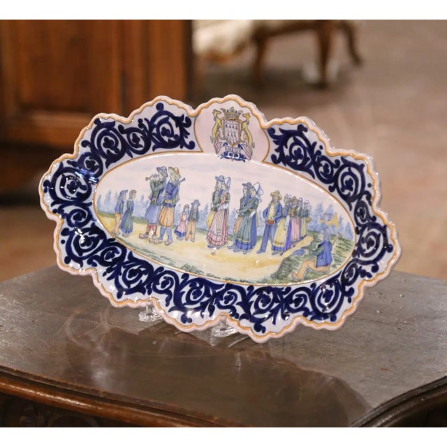 Decorative wall plaque from the renowned Henriot faïencerie in Quimper, Brittany, dating to circa 1880. Measuring 29.25...