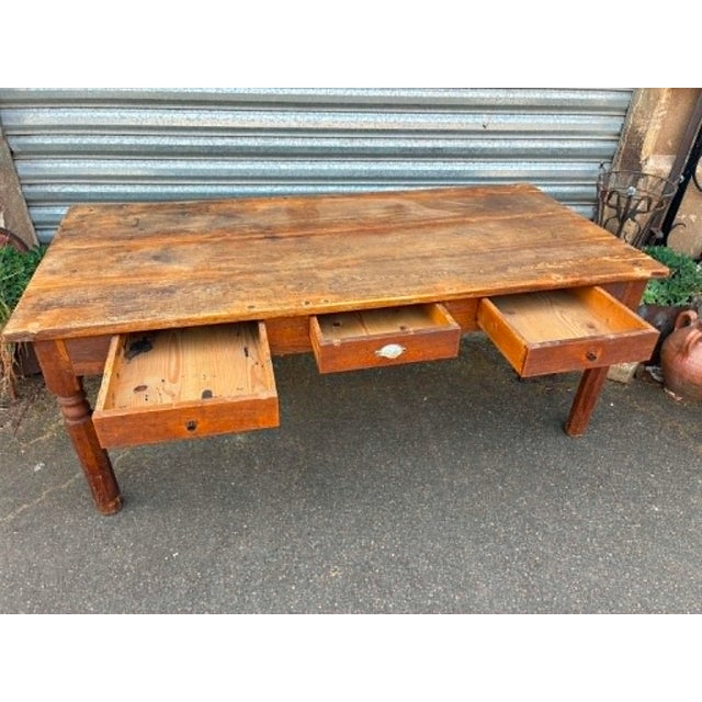 Beautiful oak dining table. Features three drawers of the same size (41 x 69 cm). Warm color, attractive tabletop....