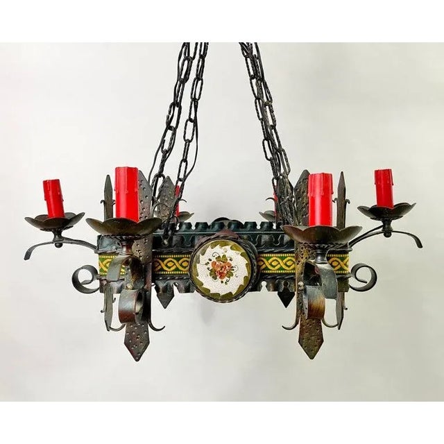 An exceptional 19th century French gothic style chandelier or pendant. The medieval style chandelier features a...