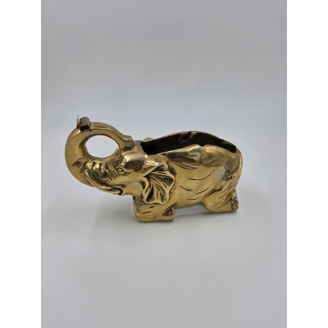 Elevate your desk setup with a touch of Hollywood Regency flair. This heavy, solid brass tape dispenser is cast in the...