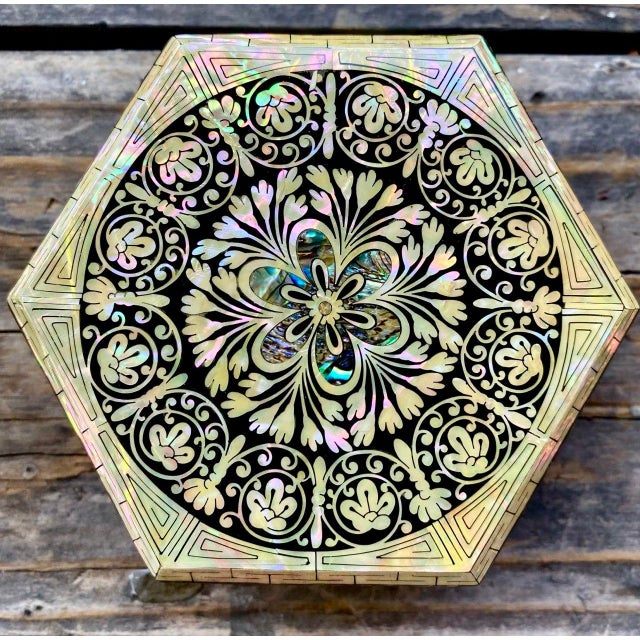 This exquisite Korean najeonchilgi lacquer box is a remarkable study in geometry, pattern and the natural iridescence of...