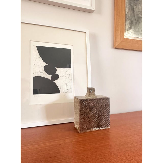 Architectural Danish studio stoneware vase from the 1970s. The vase features a rectangular sculptural form with richly...
