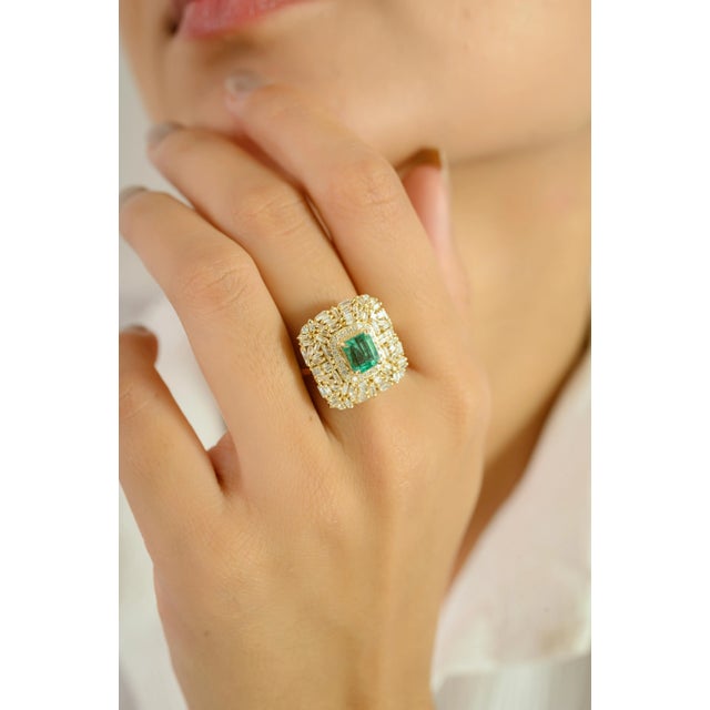 A striking expression of vintage glamour, this luxurious cocktail ring is crafted in 14k yellow gold and showcases a vivid...
