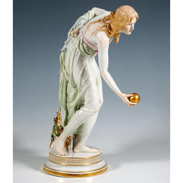 Extremely decorative, fully sculptural representation of an art nouveau beauty in a softly falling robe, tilted forward to...