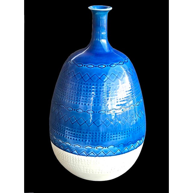 Offered is a vintage ceramic vase made in Perugia, Italy by Ceramiche Tadinate in the 1970s. It features an egg-shaped...