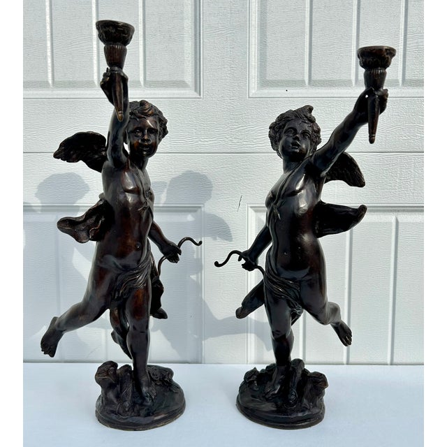 Vintage (1970's) Pair of Candle Holders have a Neo-Classic Style. Made of Bronze. Heavy. Cherub Details. The Measurements:...