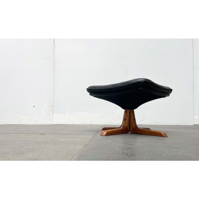 Ottoman by the Danish manufacturer Berg Furniture. The star-shaped base of the ottoman is constructed from solid teak wood...