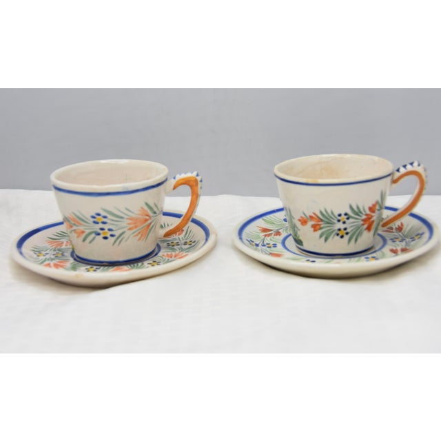 Exquisite 19th Century Henriot Quimper Faience Flat Cup & Saucer Set. This charming piece is a true testament to...