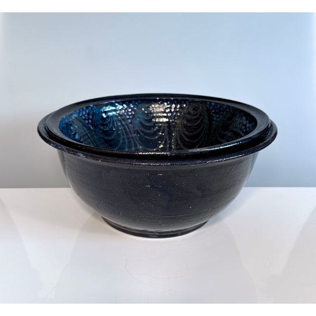 A high-quality set of two modernist studio ceramic art bowls with a mediterranean vibe. These authentic unique pieces were...