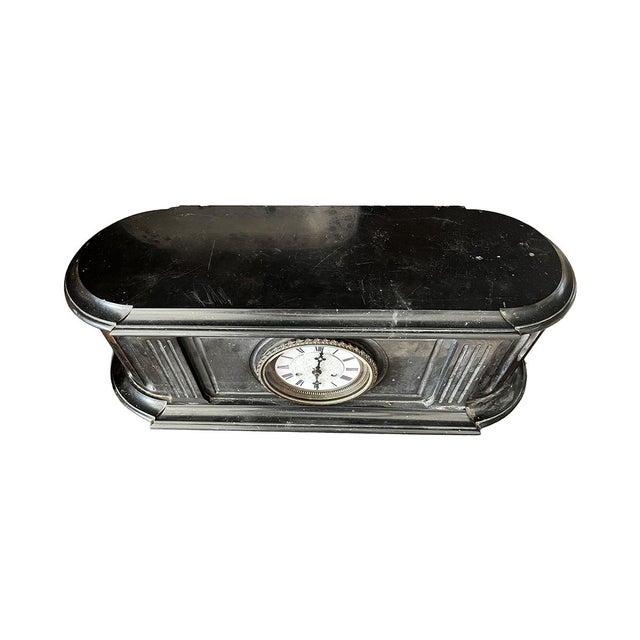 The clock is for decorative use only. The mechanism does not work. It is made of solid black marble.