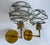 Pair of Vintage sconces by Doria 1970s, brass structure with structured cocoon Murano glass globes with dark sage green...