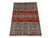 This naturally dyed wool area rug features a Khorjin saddlebag design inspired by Persian tribal weaving. Horizontal bands...