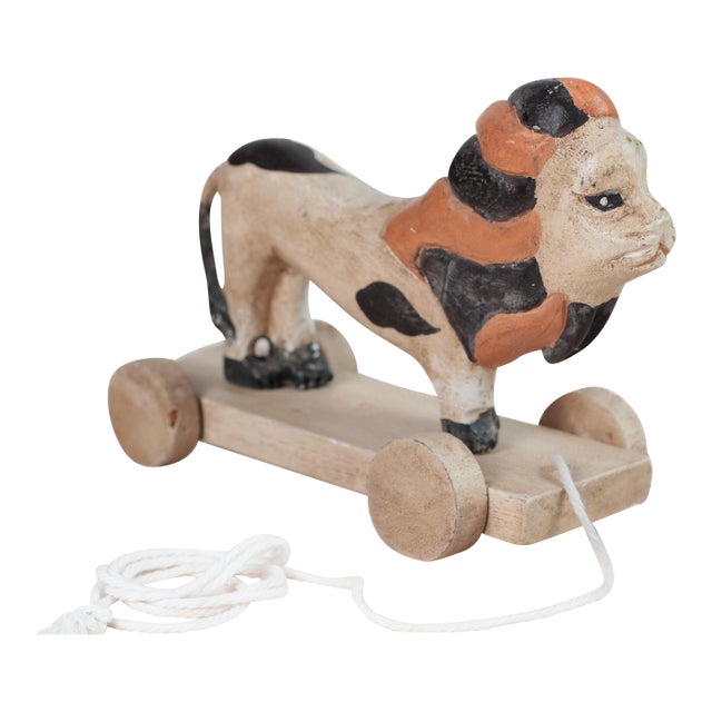 Early 20th Century Hand-Carved Painted Wood Lion Pull Toy on Wheeled Platform For Sale