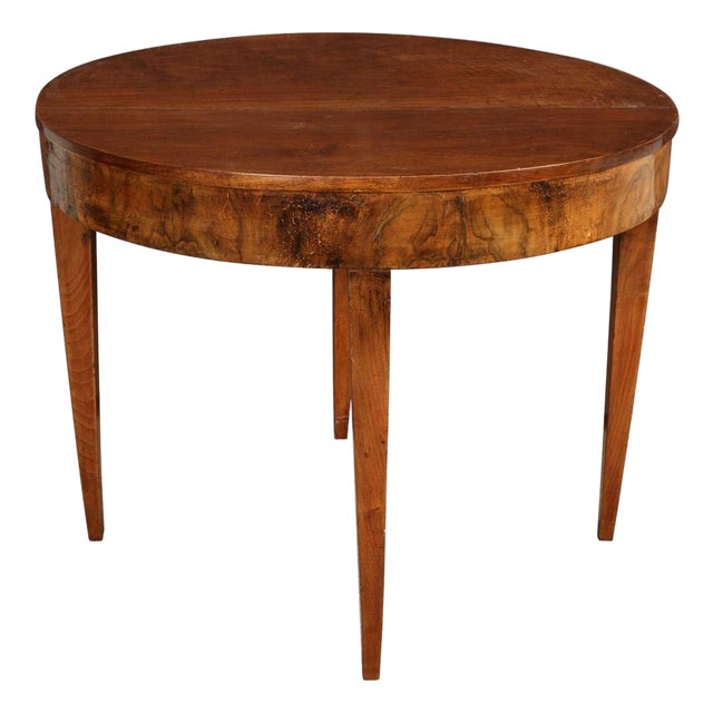 An Oval Mahogany Table With Tapered Legs For Sale