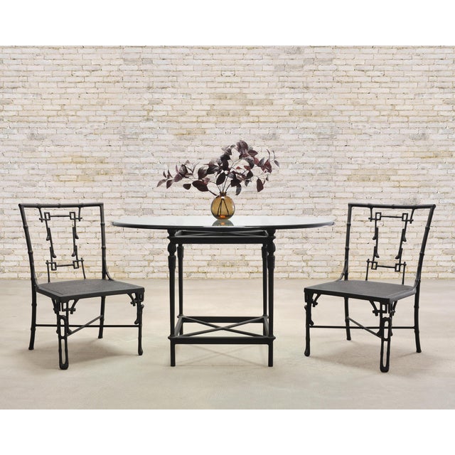 An elegant neoclassical style cast aluminum patio and garden breakfast dining table or center table designed by Michael...